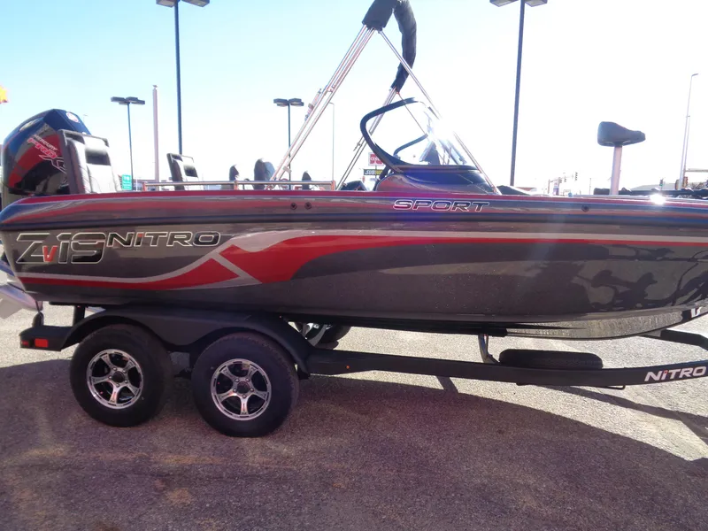 Slide: The Image of 2025 Nitro ZV19 Sport Pro boat on trailer, side view. - 3