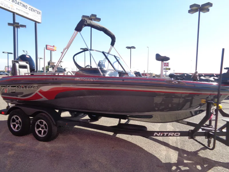 Slide: The Image of 2025 Nitro ZV19 Sport Pro boat on trailer in outdoor setting. - 5