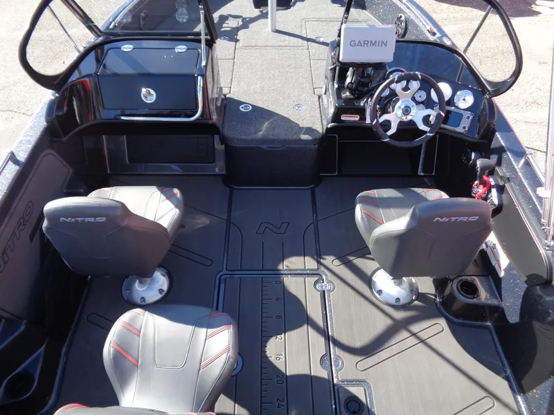 Slide: The Image of 2025 Nitro ZV19 Sport Pro boat interior with Garmin navigation system and dual seating. - 7