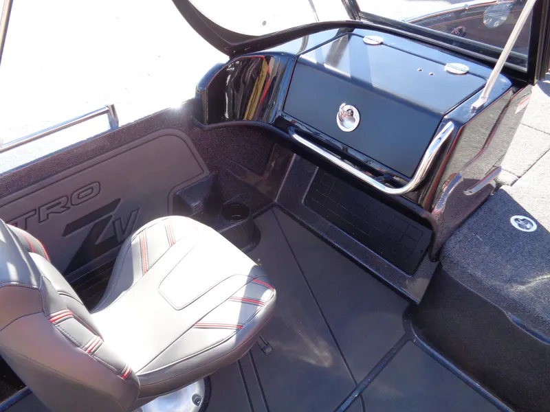Slide: The Image of 2025 Nitro ZV19 Sport Pro boat interior with sleek seating and dashboard design. - 8