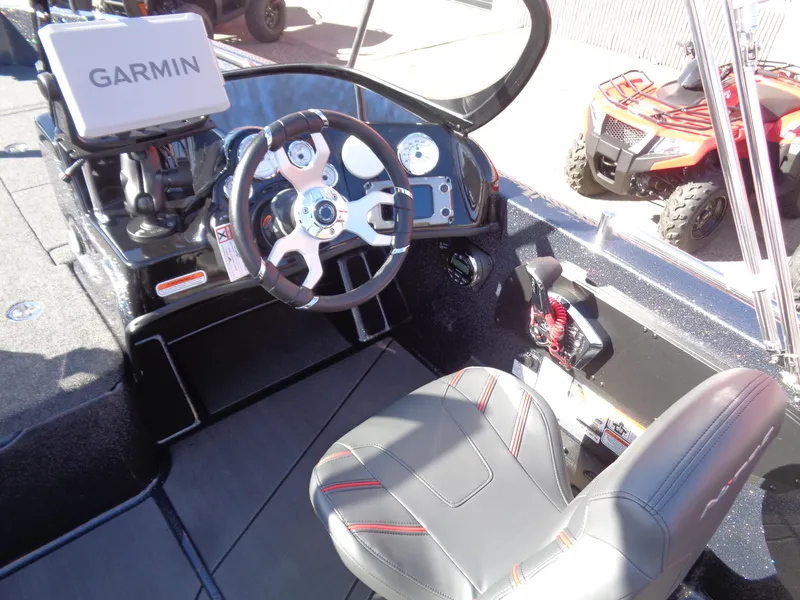 Slide: The Image of 2025 Nitro ZV19 Sport Pro boat cockpit with Garmin navigation system. - 9