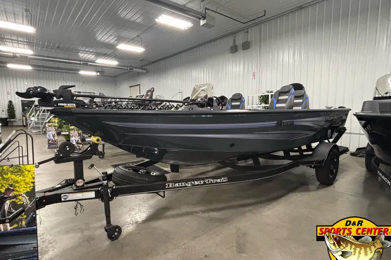 The Image of 2025 Ranger VS1682SC Angler boat displayed indoors on a trailer. - 0