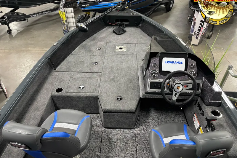 Slide: The Image of 2025 Ranger VS1682SC Angler boat interior with Lowrance system and seating. - 4
