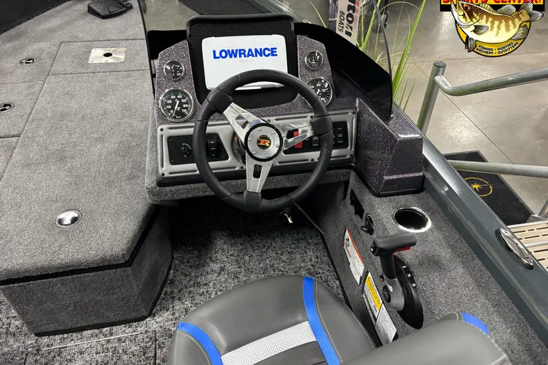Slide: The Image of 2025 Ranger VS1682SC Angler boat cockpit with Lowrance display and steering wheel. - 5