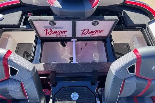 Slide: The Image of 2025 Ranger Z521R Cup-Equipped boat interior with storage compartments open. - 14