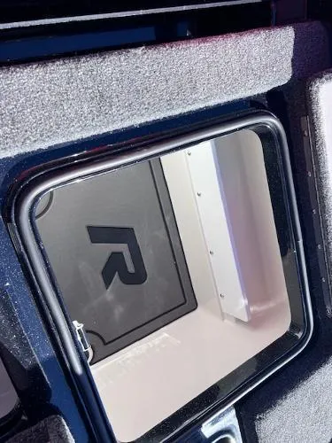 Slide: The Image of 2025 Ranger Z521R Cup-Equipped storage compartment with sleek interior design. - 17