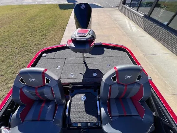 Slide: The Image of 2025 Ranger Z521R Cup-Equipped boat interior with dual seats and storage compartments. - 4