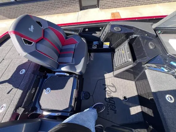 Slide: The Image of 2025 Ranger Z521R Cup-Equipped boat interior with premium seating and storage compartments. - 6