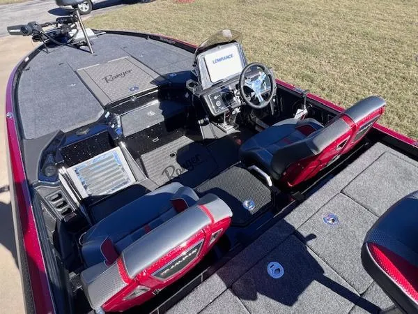 Slide: The Image of 2025 Ranger Z521R Cup-Equipped boat interior with advanced navigation system and comfortable seating. - 9