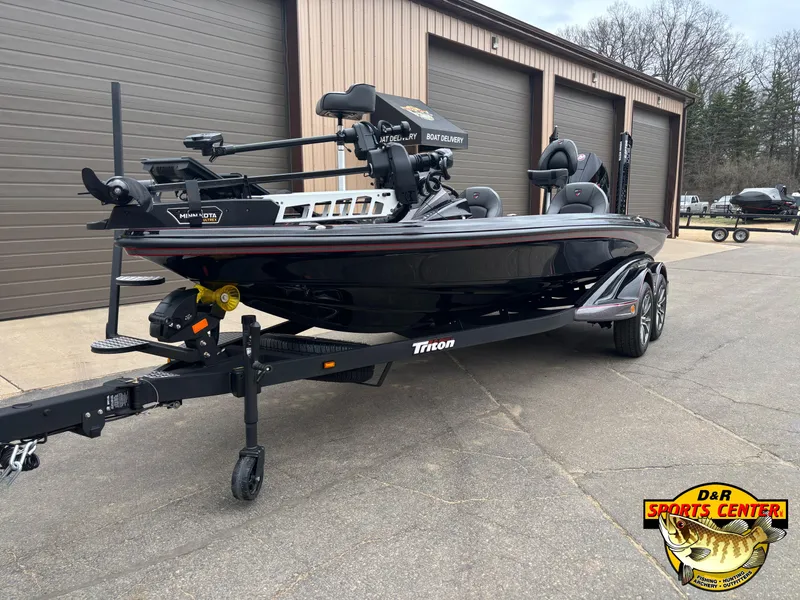 Slide: The Image of 2025 Triton 21XP boat on trailer at D&R Sports Center, featuring Minn Kota motor. - 4