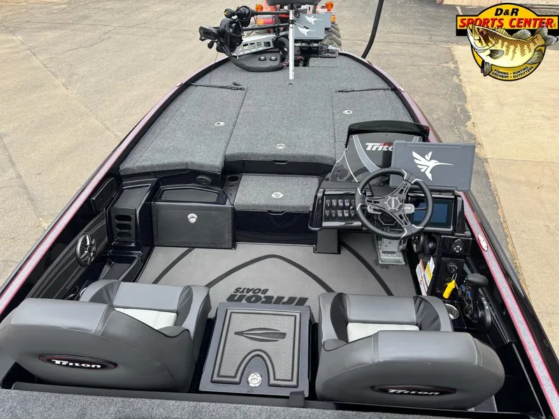 Slide: The Image of 2025 Triton 21XP boat interior with steering console, seats, and fishing equipment at D&R Sports Center. - 8
