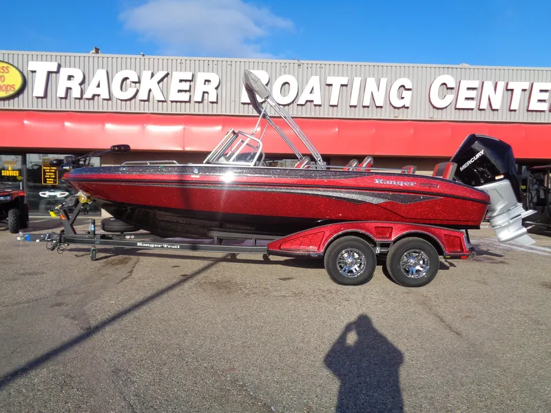Slide: The Image of 2025 Ranger 2050MS boat in vibrant red at Tracker Boating Center. - 0