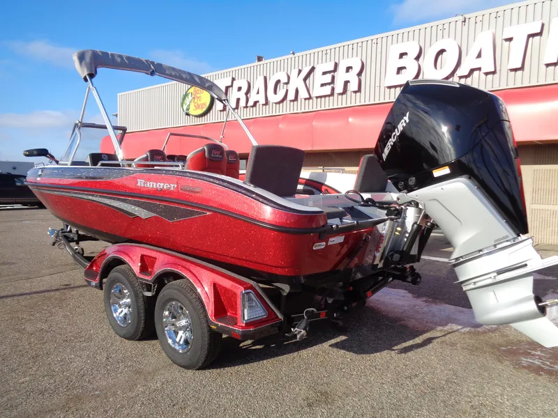 Slide: The Image of 2025 Ranger 2050MS boat with Mercury engine at dealership. - 5