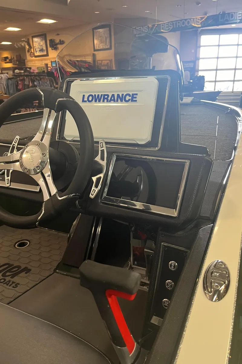 Slide: The Image of 2025 Ranger Z521R Cup-Equipped boat dashboard with Lowrance electronics. - 5