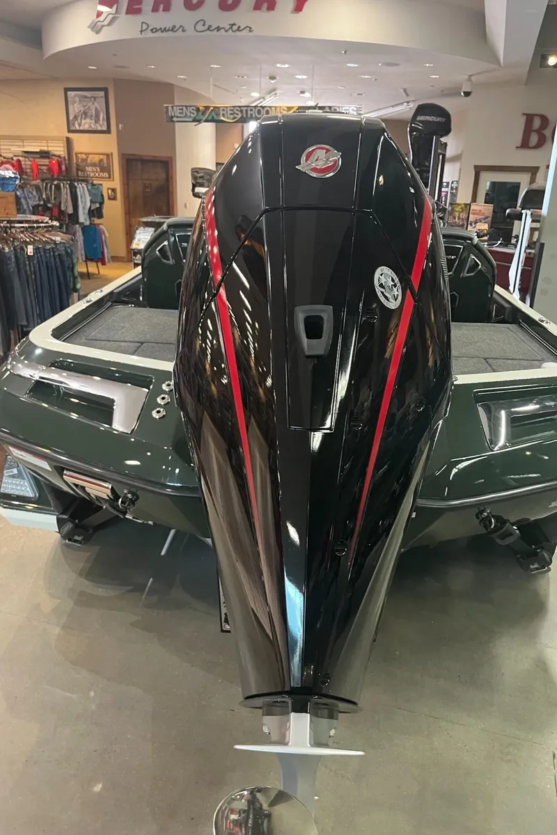 Slide: The Image of 2025 Ranger Z521R Cup-Equipped boat displayed indoors, showcasing sleek design and powerful engine. - 7