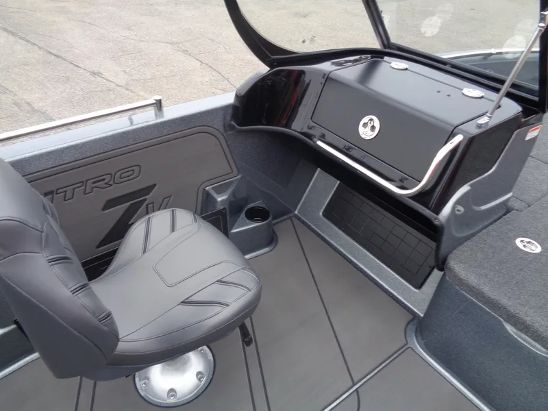 Slide: The Image of 2025 Nitro ZV19 Sport boat interior with sleek seating and modern dashboard design. - 10