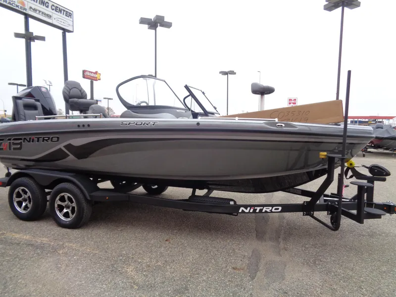 Slide: The Image of 2025 Nitro ZV19 Sport boat on trailer in parking lot. - 3