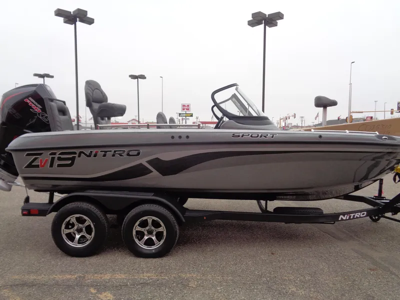 Slide: The Image of 2025 Nitro ZV19 Sport boat on trailer, side view, gray color. - 5