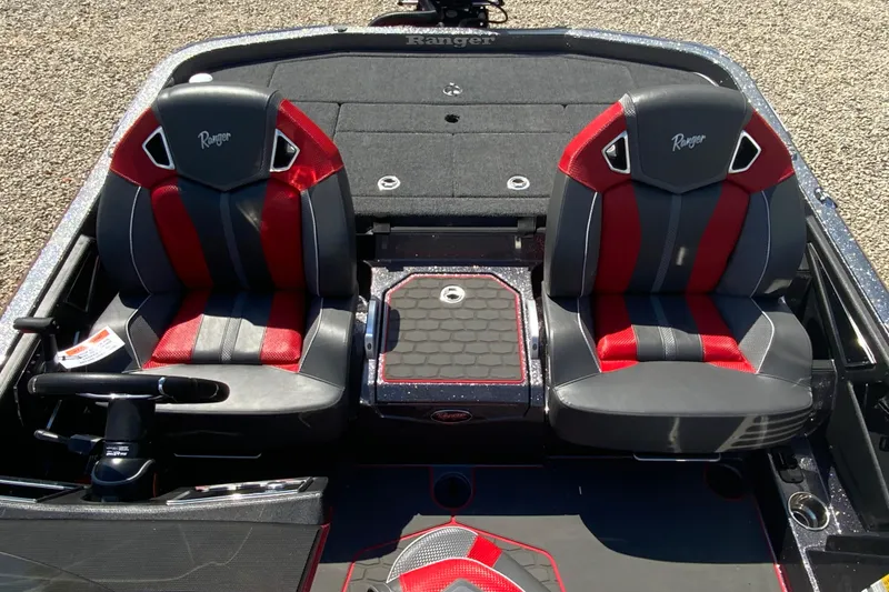Slide: The Image of 2025 Ranger Z521R boat interior with red and black seats, sleek design. - 11