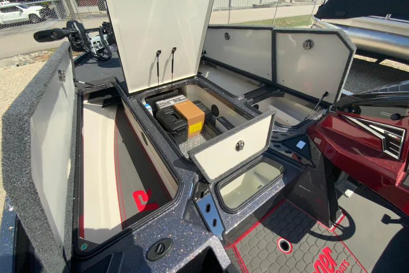 Slide: The Image of 2025 Ranger Z521R boat storage compartments open, showcasing spacious interior and equipment. - 13