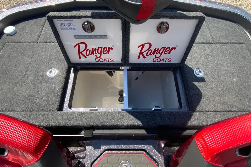 Slide: The Image of 2025 Ranger Z521R boat storage compartment with red accents and Ranger Boats branding. - 17