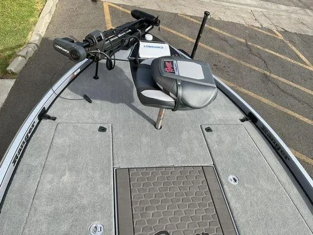 Slide: The Image of 2025 Ranger Z521R Cup-Equipped boat deck with fishing seat and equipment. - 6