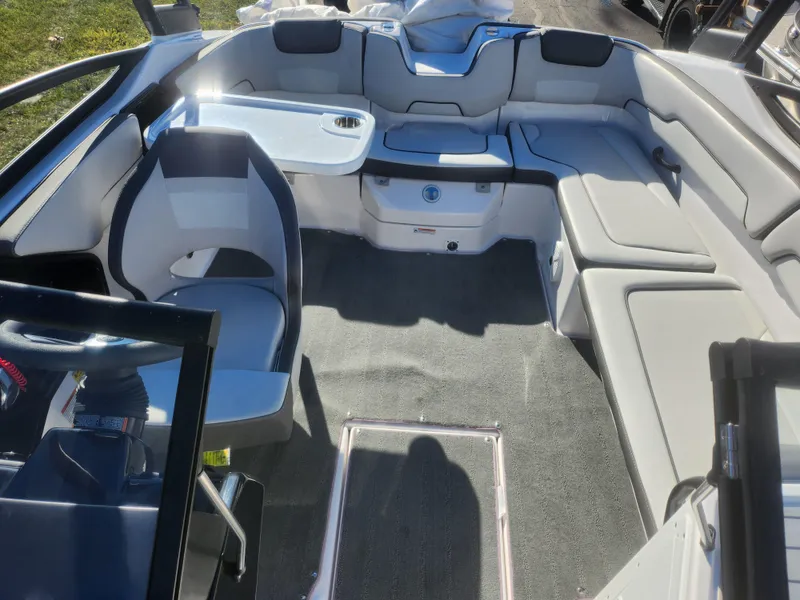 Slide: The Image of 2023 Yamaha AR190 boat interior with sleek seating and modern design. - 19