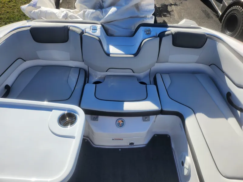 Slide: The Image of 2023 Yamaha AR190 boat interior with sleek seating and cup holder. - 20