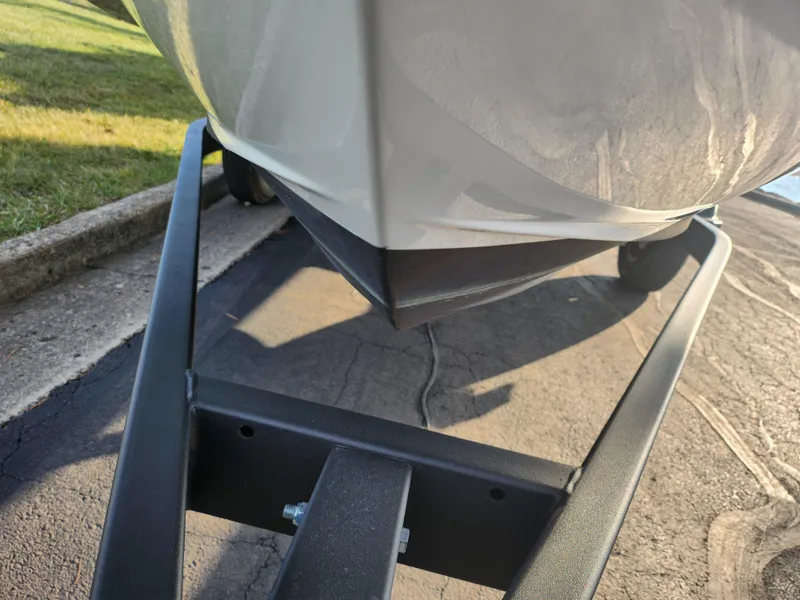 Slide: The Image of 2022 Bayliner VR4 Bowrider OB on trailer, close-up view of hull and trailer. - 7