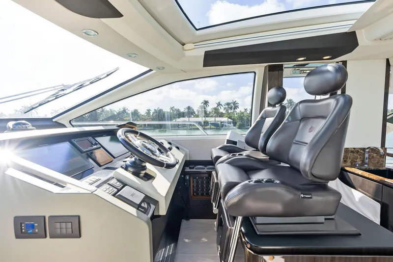 Slide: The Image of Luxurious interior of 2017 Azimut 77S yacht with modern helm and leather seating. - 17
