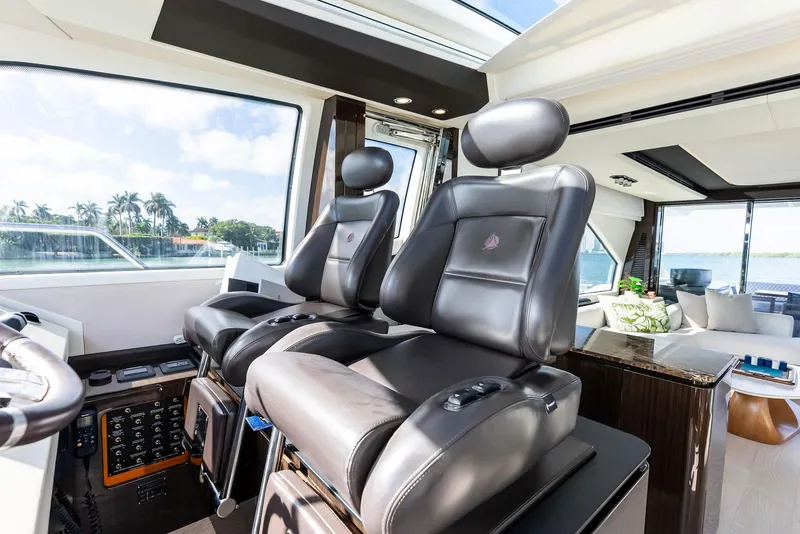Slide: The Image of Luxurious interior of 2017 Azimut 77S yacht with leather seating and panoramic windows. - 18