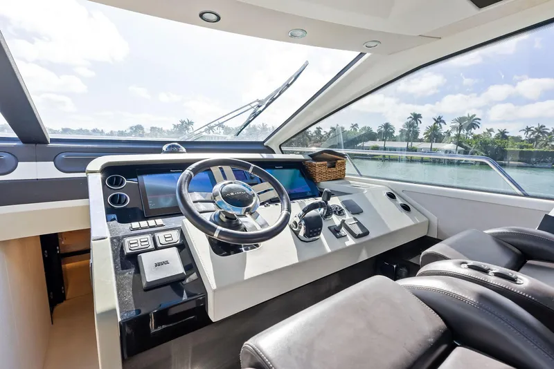 Slide: The Image of Luxurious 2017 Azimut 77S yacht helm with modern controls and panoramic view. - 19