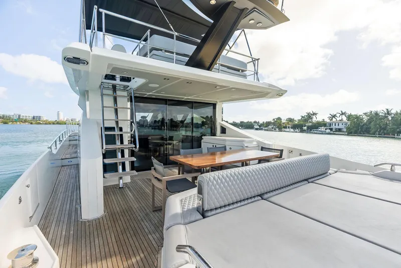 Slide: The Image of Luxurious 2017 Azimut 77S yacht deck with seating and dining area. - 35