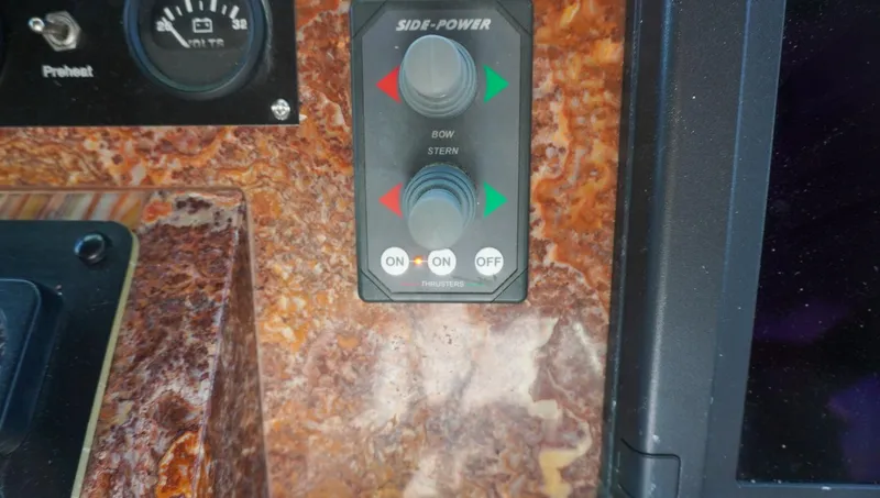 Slide: The Image of Control panel of a 1990 Hatteras 62 Cockpit Motor Yacht with bow and stern controls. - 20