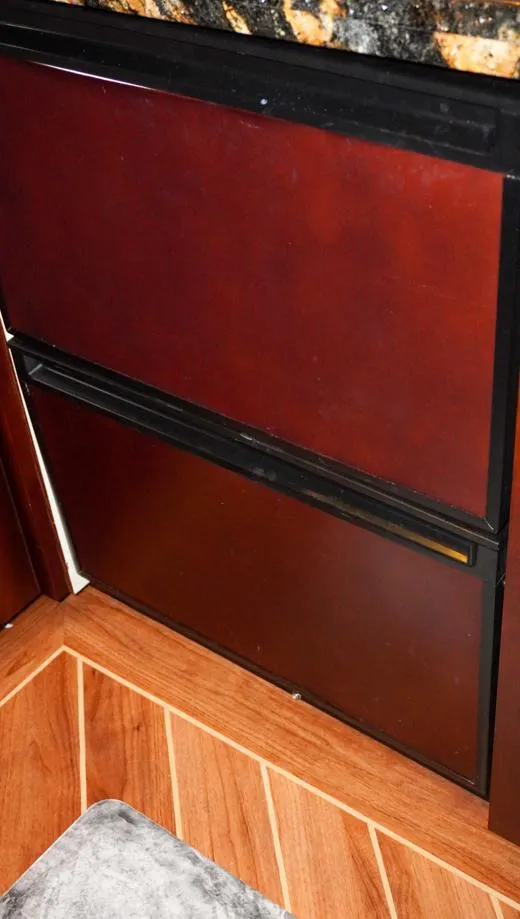 Slide: The Image of Wood-paneled interior of 1990 Hatteras 62 Cockpit Motor Yacht. - 42