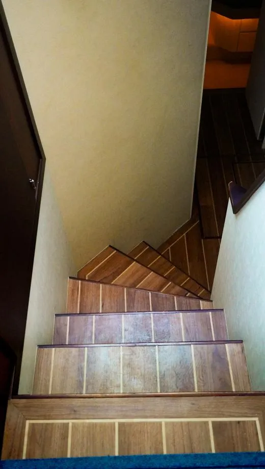 Slide: The Image of Wooden staircase inside 1990 Hatteras 62 Cockpit Motor Yacht. - 46