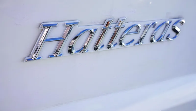 Slide: The Image of Chrome "Hatteras" logo on a 1990 Hatteras 62 Cockpit Motor Yacht. - 8