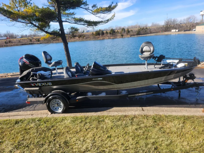 Slide: The Image of 2020 Vexus AVX1880 boat by a lake on a sunny day. - 10