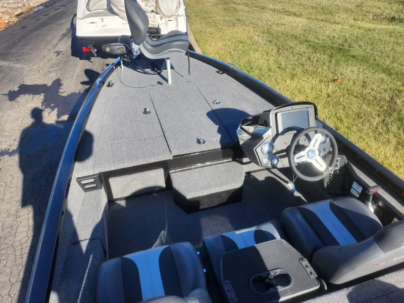 Slide: The Image of 2020 Vexus AVX1880 fishing boat interior with steering console and seating. - 12