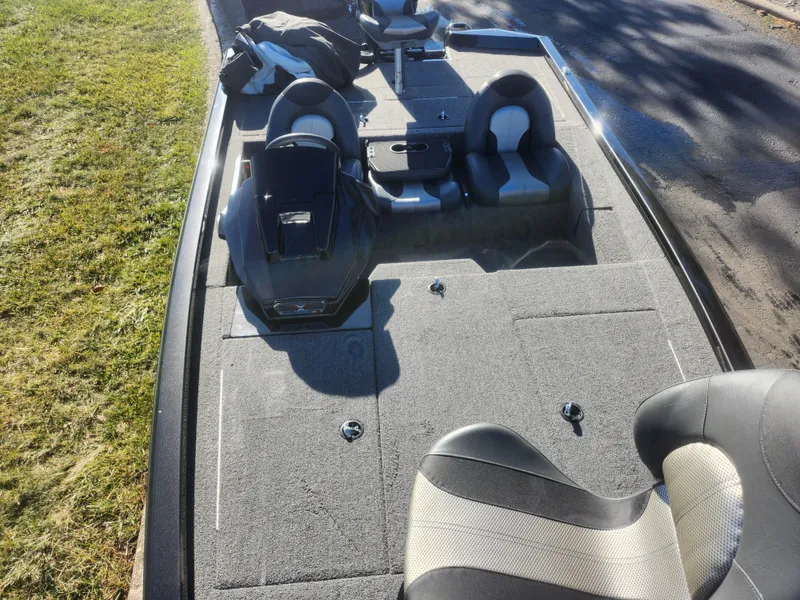 Slide: The Image of 2020 Vexus AVX1880 boat interior with seating and storage compartments. - 19