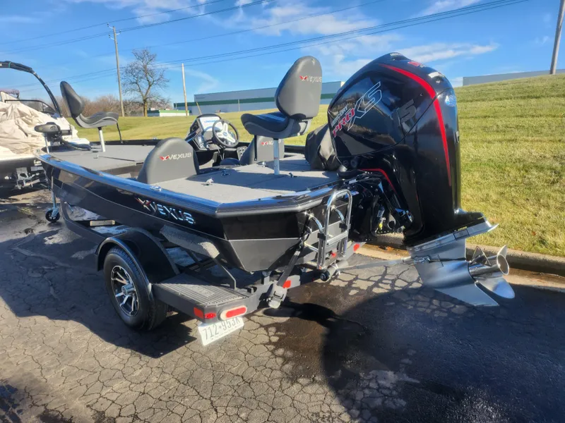Slide: The Image of 2020 Vexus AVX1880 boat with powerful outboard motor on a trailer. - 3