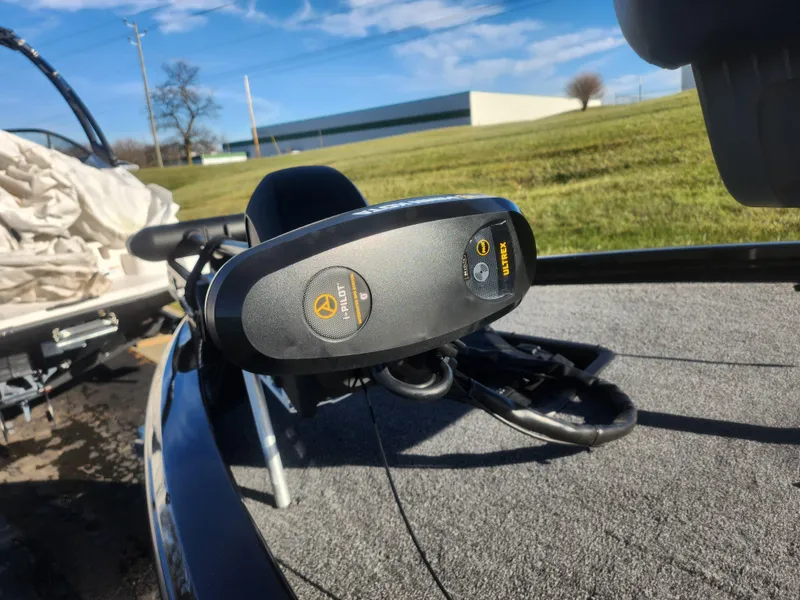 Slide: The Image of 2020 Vexus AVX1880 boat with trolling motor on deck, outdoors. - 5