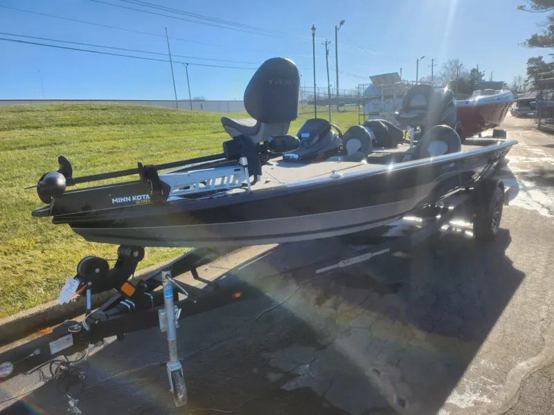 Slide: The Image of 2020 Vexus AVX1880 boat on trailer in sunny outdoor setting. - 6