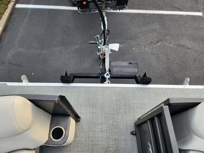 Slide: The Image of 2020 Crest Classic DLX 220 SLC boat interior with trailer hitch view. - 22