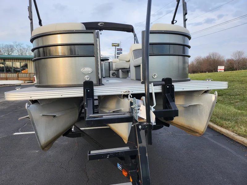 Slide: The Image of 2020 Crest Classic DLX 220 SLC pontoon boat on trailer, rear view. - 6