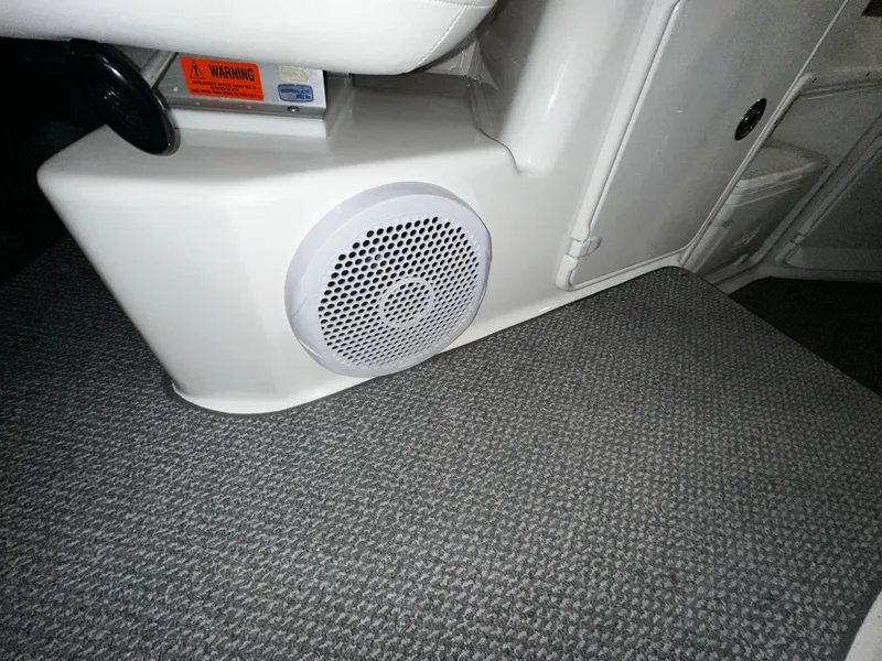 Slide: The Image of 2011 Regal 3060 Window Express interior with speaker and carpeted flooring. - 21