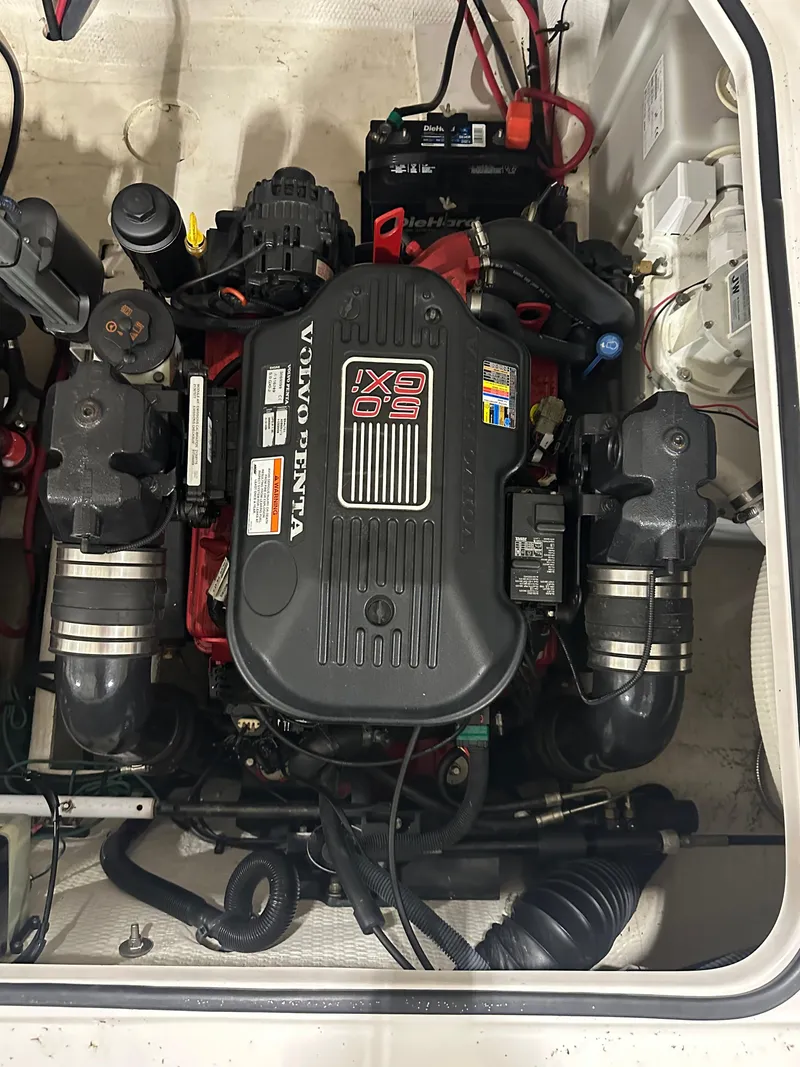Slide: The Image of Engine compartment of a 2011 Regal 3060 Window Express with Volvo Penta 5.0 GXI engine. - 35