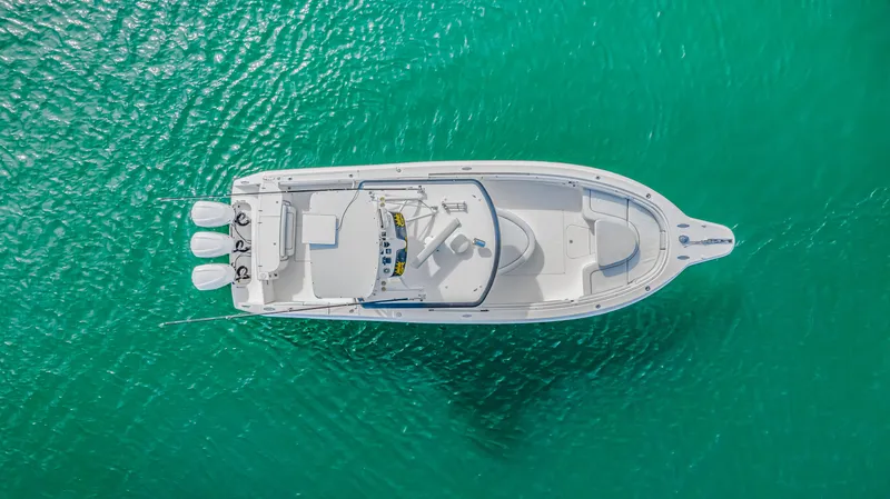 Slide: The Image of Aerial view of 2016 Stamas 390 Tarpon boat on turquoise water. - 15
