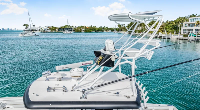 Slide: The Image of 2016 Stamas 390 Tarpon boat on water, featuring a sleek design and fishing equipment. - 17