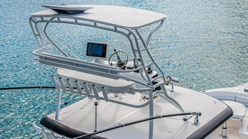 Slide: The Image of 2016 Stamas 390 Tarpon boat helm with canopy on clear water. - 19